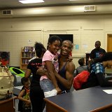 Edward Spots, AILEY II dancer congratulates Accent Academy of the Performing Arts dancer who participated on stage during the Lecture Demonstration