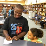 Jason Jones, AileyCamp Kansas: Topeka Coordinator with his daughter during the reception