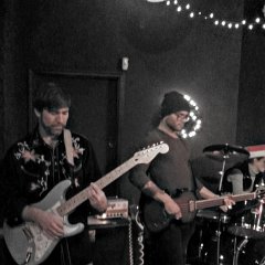 Nat Dingman (left), also sharing lead guitar duties, Josh Hartranft (center) of Chris Aytes &#38; The Good Ambition on bass