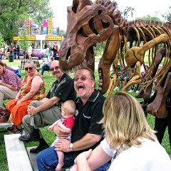 This very cool monster puppet was expertly brought to life by the puppeteer (whom you can see in this pic dressed in black inside the T-Rex). Here the T-Rex continues to go from person to person trying to eat their heads!  You can also see the sheet terror in Tim Durham's eyes. :-)